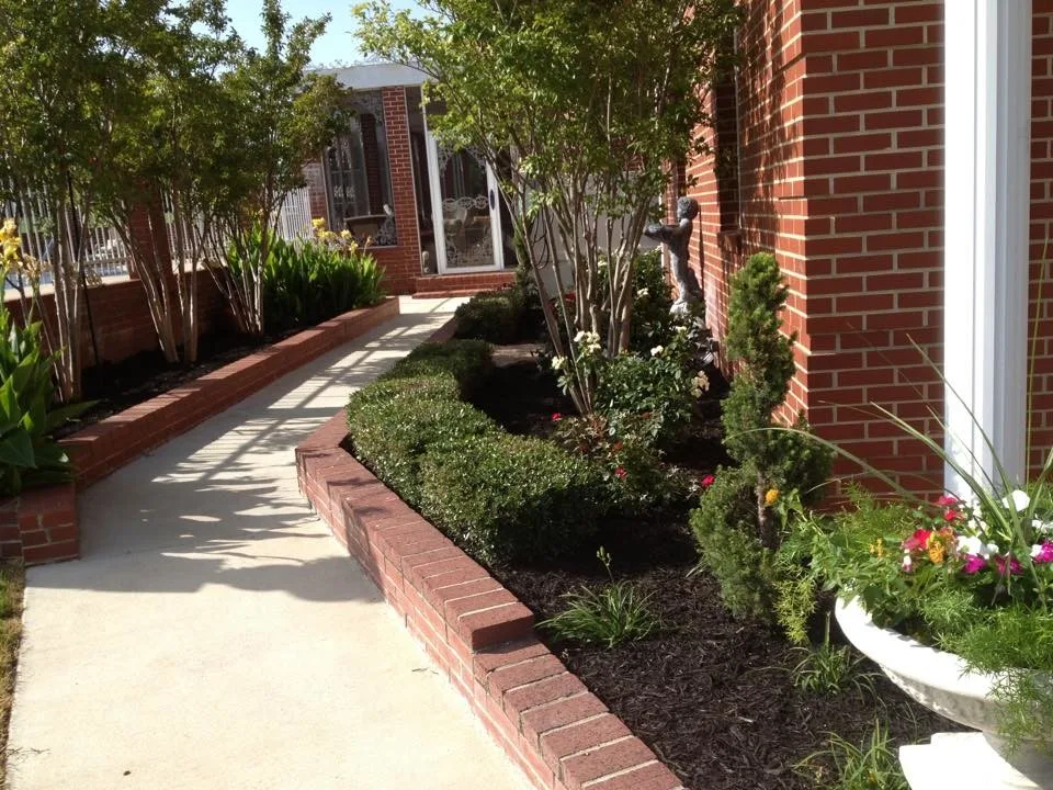 Hometown Lawns Landscape Management - Photo 13