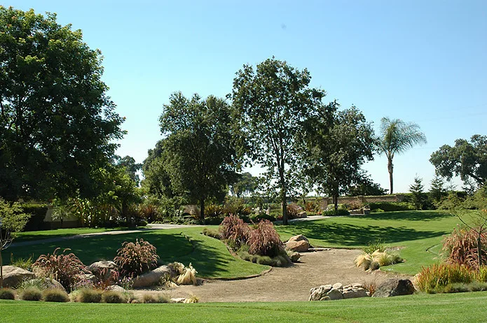 Mediterranean Manor by Plant Systems Landscape - Photo 6