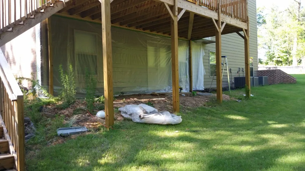 Layered Patio with Koi Pond and Water Features by McCormick Landscaping / Aquatic Solutions - Photo 9