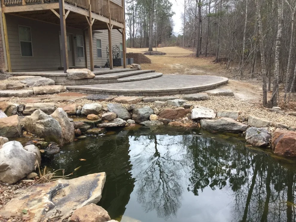 Layered Patio with Koi Pond and Water Features by McCormick Landscaping / Aquatic Solutions - Photo 8