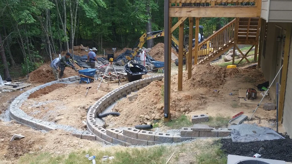 Layered Patio with Koi Pond and Water Features by McCormick Landscaping / Aquatic Solutions - Photo 7