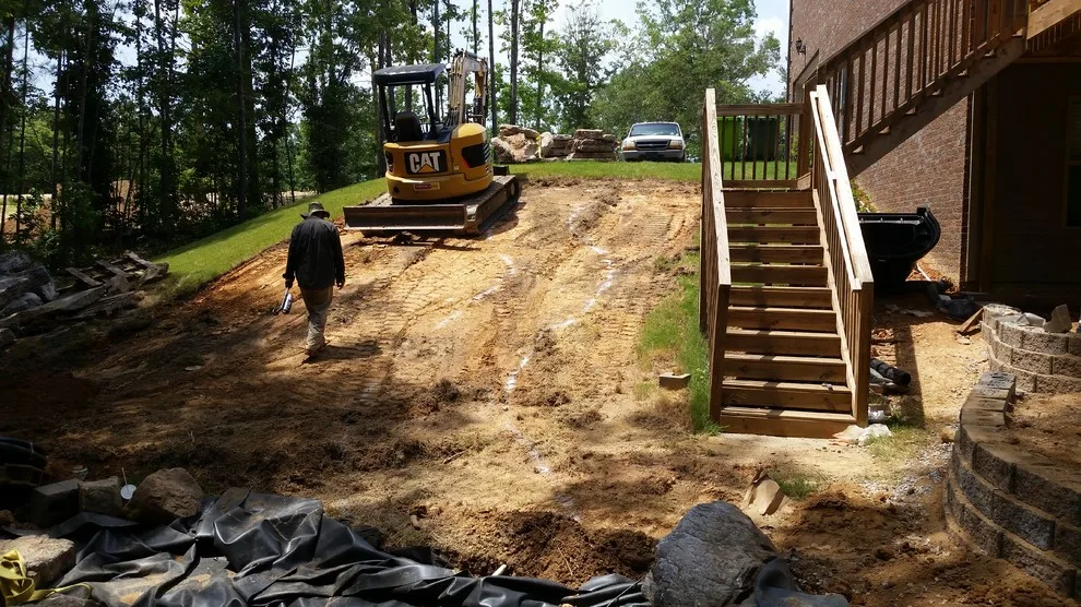 Layered Patio with Koi Pond and Water Features by McCormick Landscaping / Aquatic Solutions - Photo 6