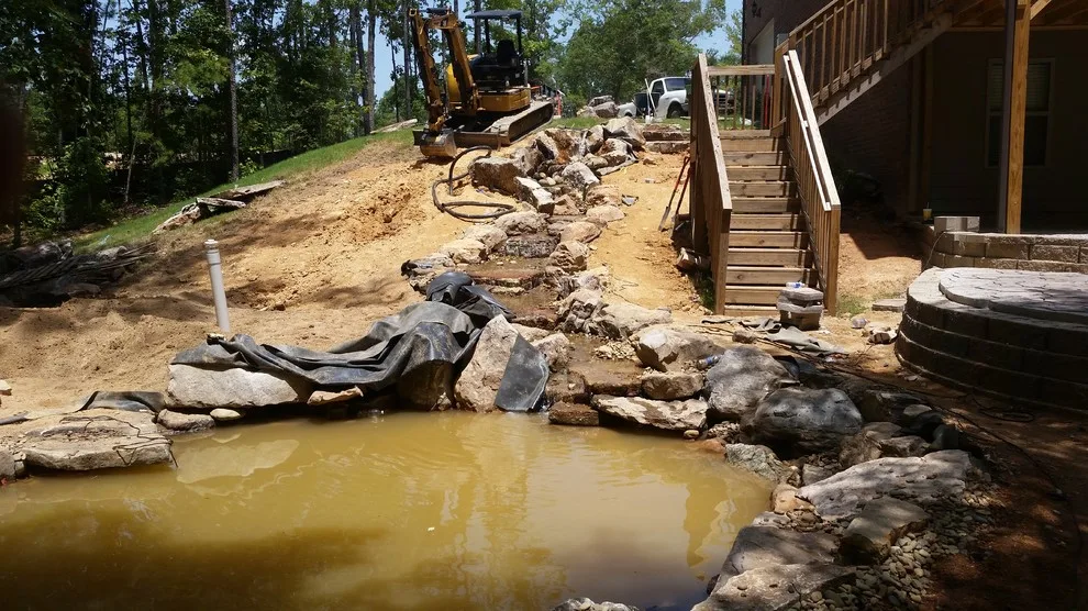 Layered Patio with Koi Pond and Water Features by McCormick Landscaping / Aquatic Solutions - Photo 3