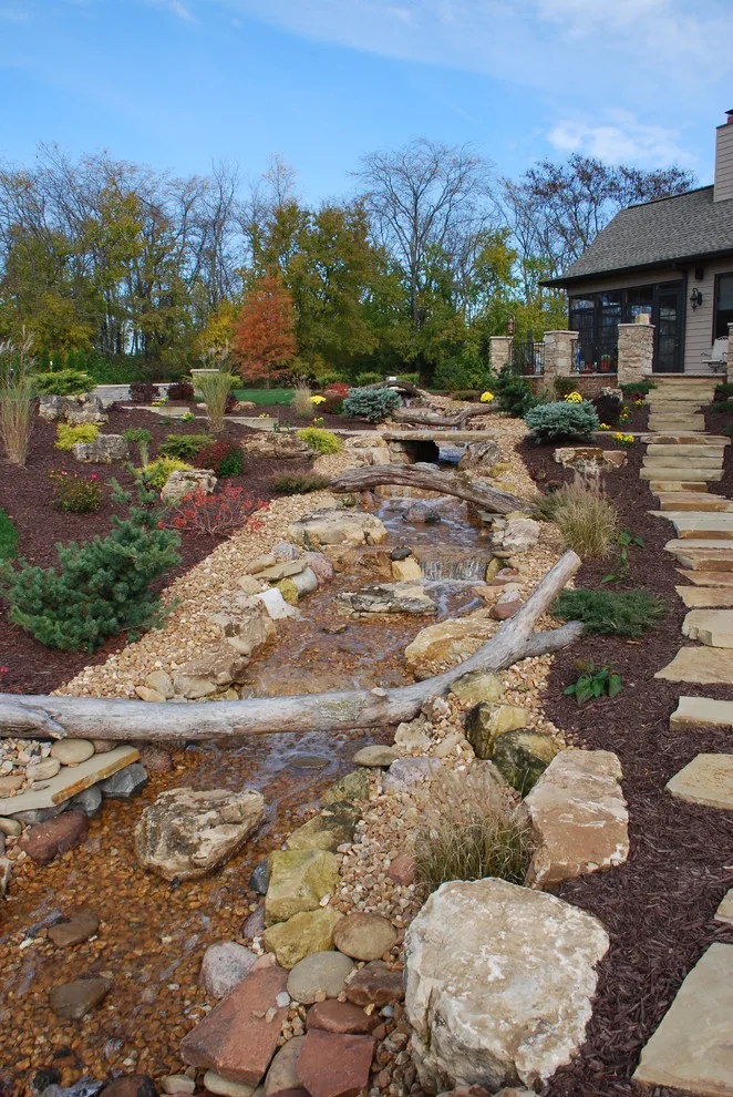 Outdoor Living Space with Pool Landscaping and Waterfall by Outdoor Innovations - Photo 3