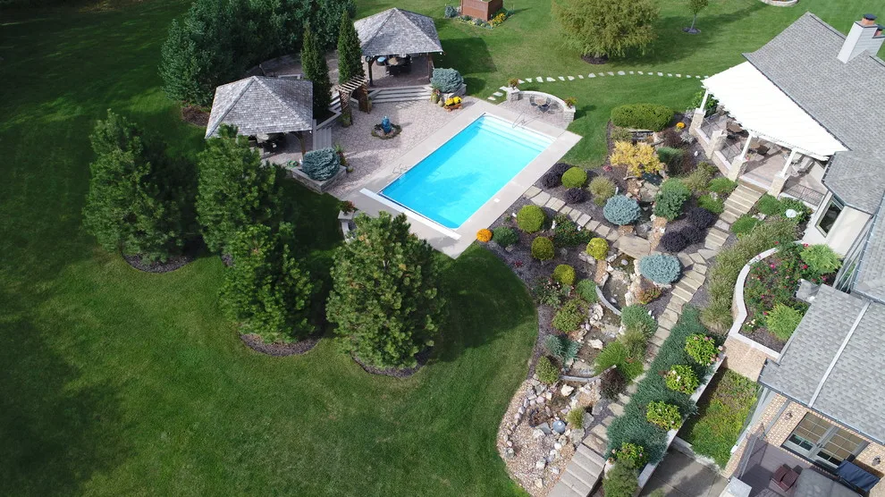 Outdoor Living Space with Pool Landscaping and Waterfall by Outdoor Innovations - Photo 6