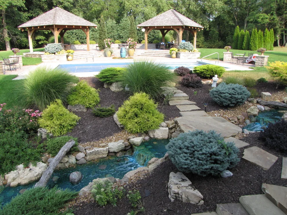 Outdoor Living Space with Pool Landscaping and Waterfall by Outdoor Innovations - Photo 5