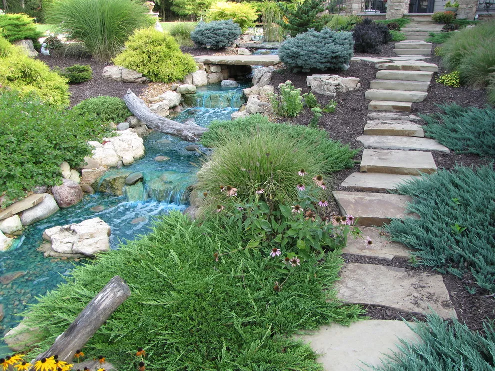Outdoor Living Space with Pool Landscaping and Waterfall by Outdoor Innovations - Photo 4