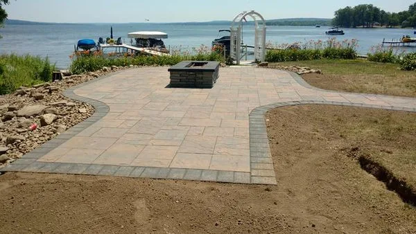 Outdoor space featuring a gas fire pit by Marlinski Landscape & Stone Work - Photo 2