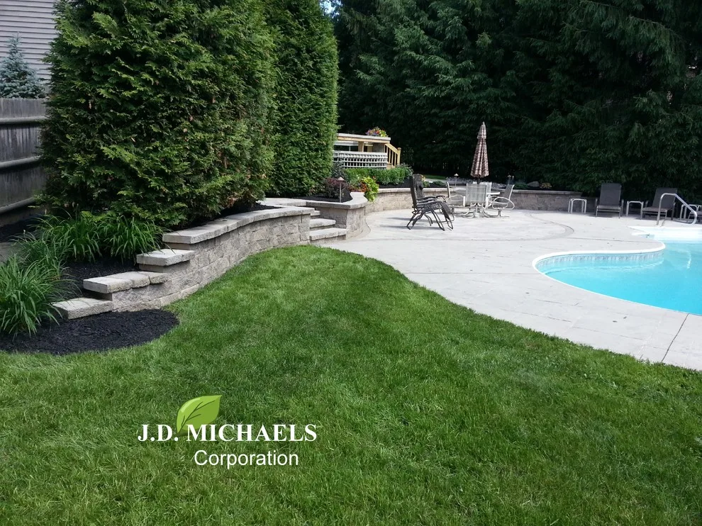 Patio by the Pool by JD Michaels Landscape - Photo 12