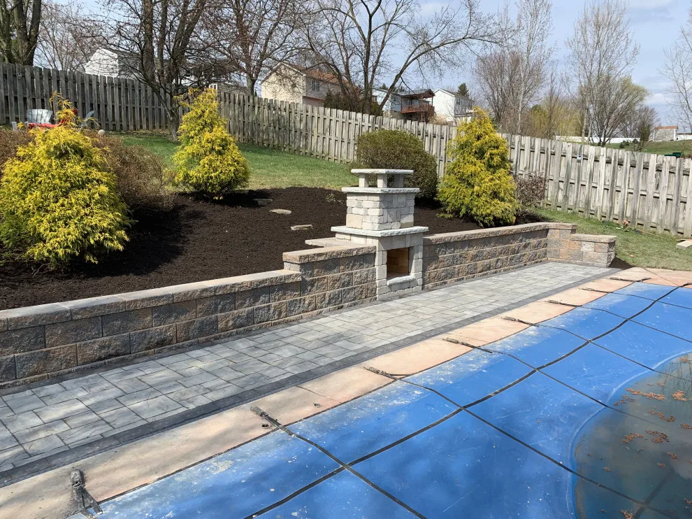 Fireplace by the Pool by Schellhaas Landscape Construction - Photo 2