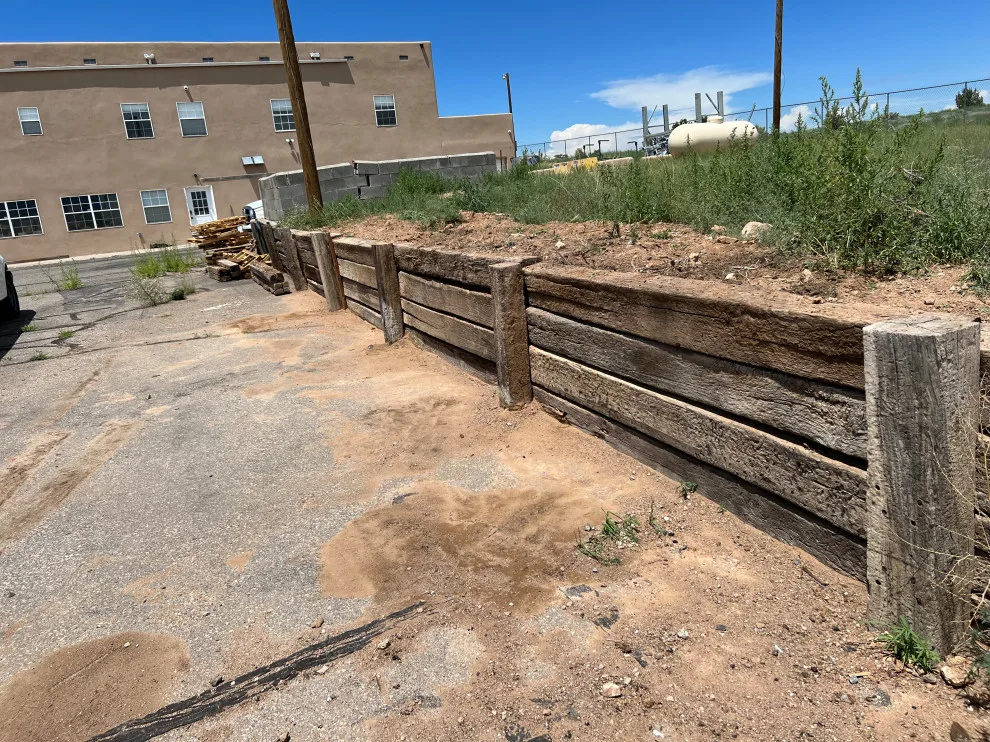retaining structure by Mencos Landscaping - Photo 4