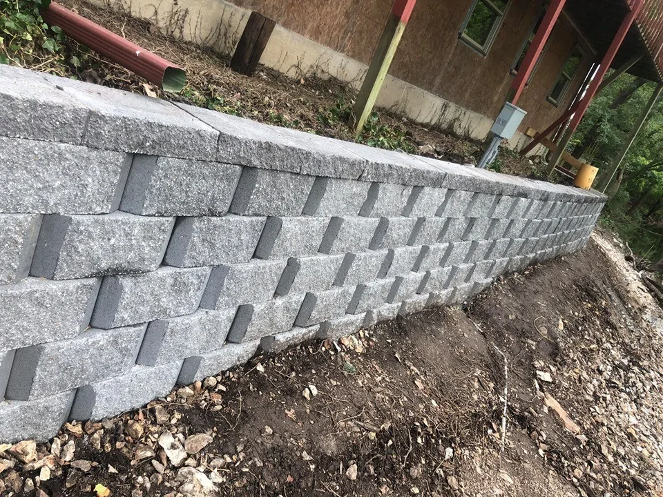 Rock Retaining Structure by R&D Lawn Care And Landscaping - Photo 2