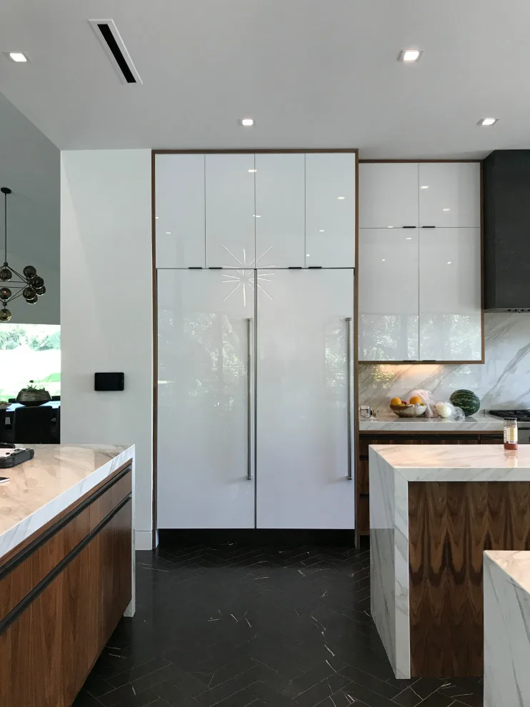 Contemporary Walnut Kitchen Featuring Three Islands by Servigon Construction Group - Photo 2