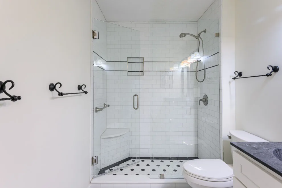 Vintage Monochrome Bathroom Renovation by Semper Fi Custom Remodeling - Photo 4