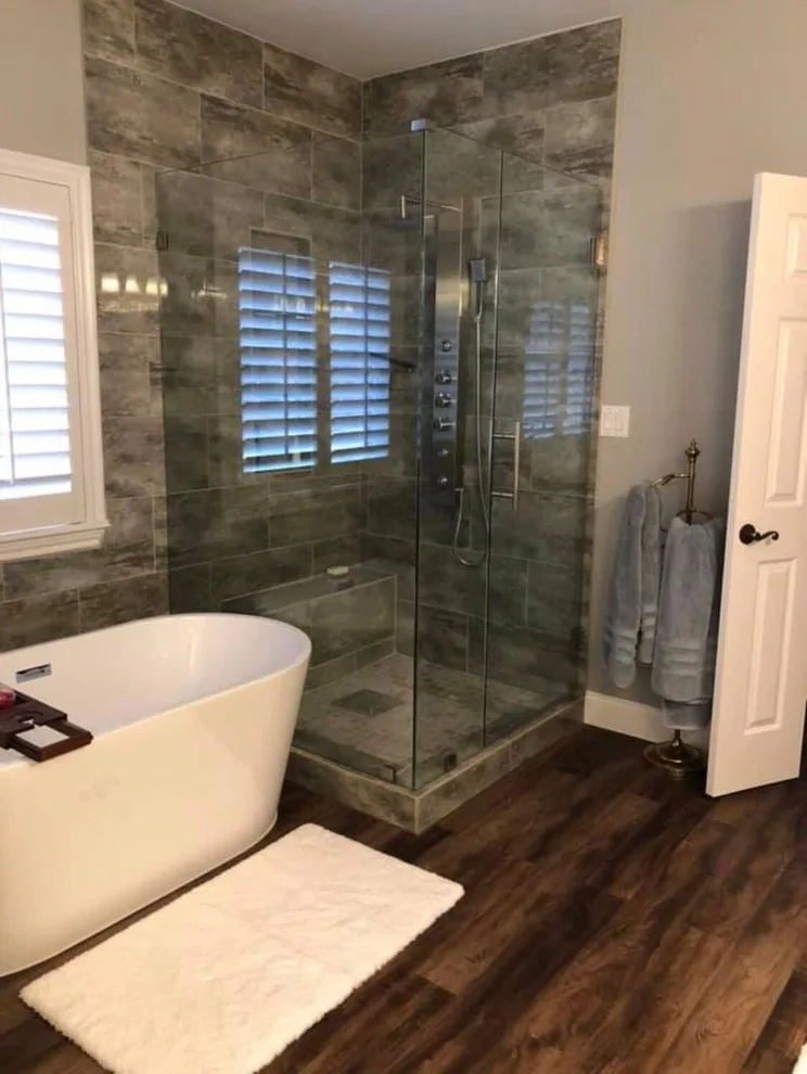 Contemporary Bathroom Renovation by SLM General Contractors, LLC - Photo 12