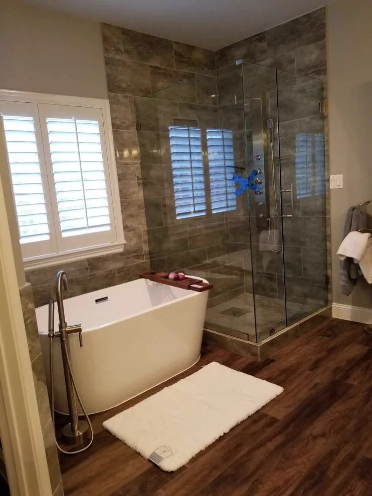 Contemporary Bathroom Renovation by SLM General Contractors, LLC - Photo 15