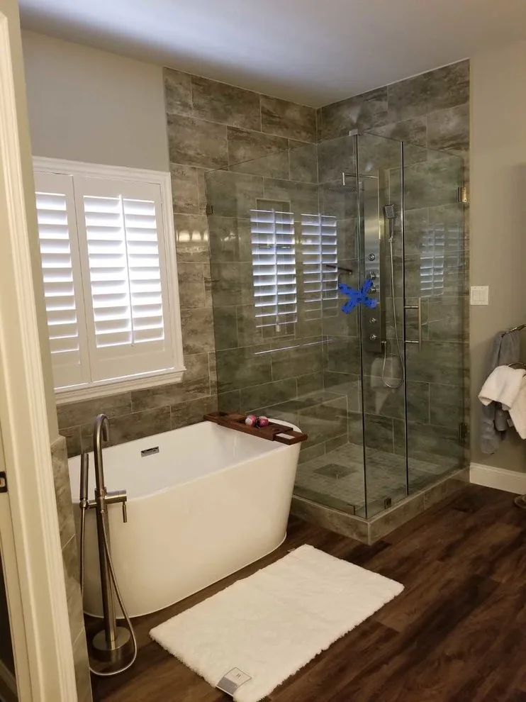 Contemporary Bathroom Renovation by SLM General Contractors, LLC - Photo 13