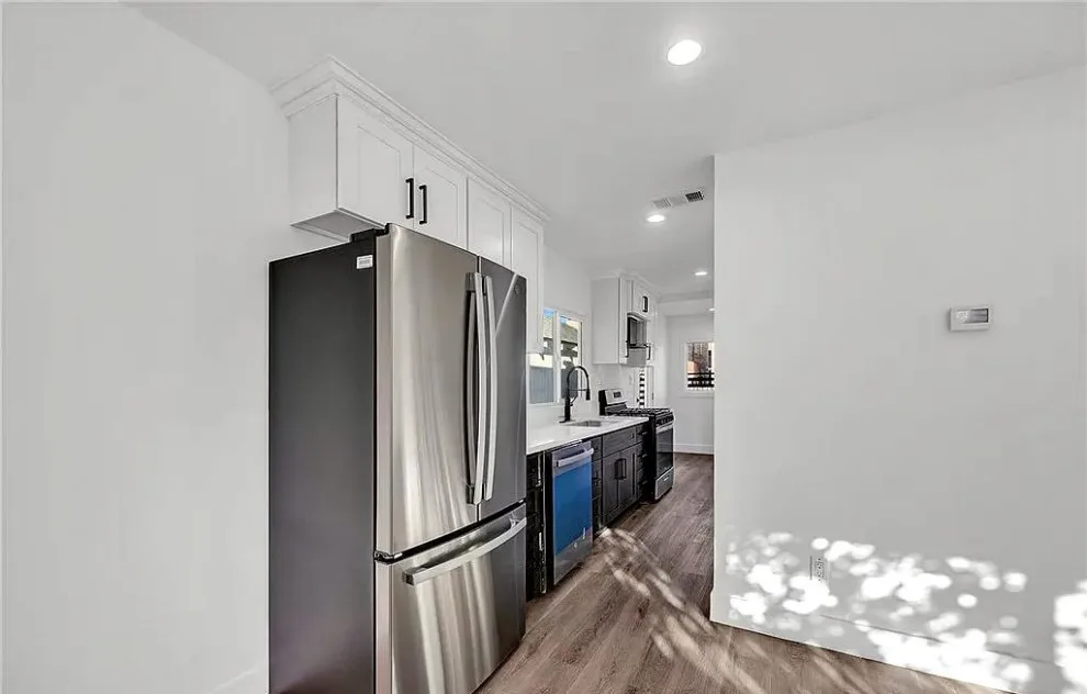 Contemporary House Remodeling by Build Construction Corporation - Photo 9