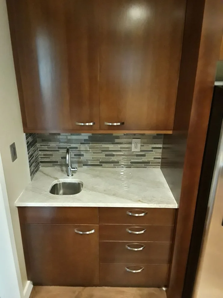 Contemporary Kitchen Renovation by SLM General Contractors, LLC - Photo 34