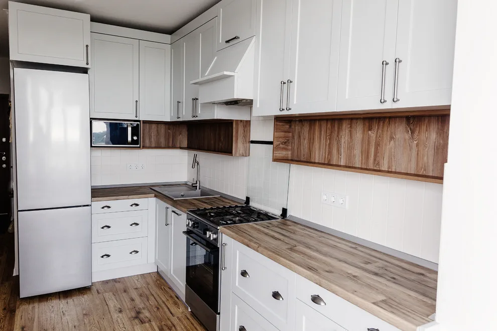 Timber Highlighted Kitchen by Kitchen Master Design & Remodeling LLC - Photo 16