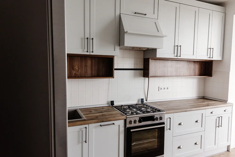 Timber Highlighted Kitchen by Kitchen Master Design & Remodeling LLC - Photo 12