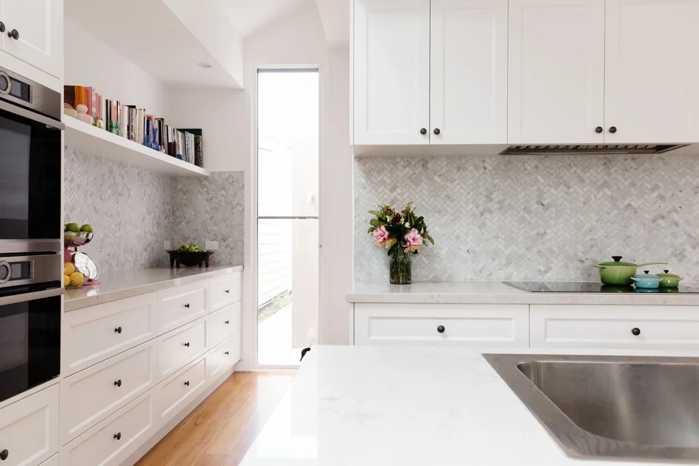 Impeccably White Kitchen by Kitchen Master Design & Remodeling LLC - Photo 3