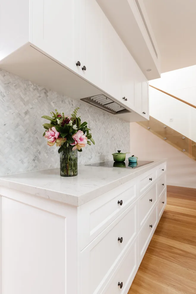 Impeccably White Kitchen by Kitchen Master Design & Remodeling LLC - Photo 2
