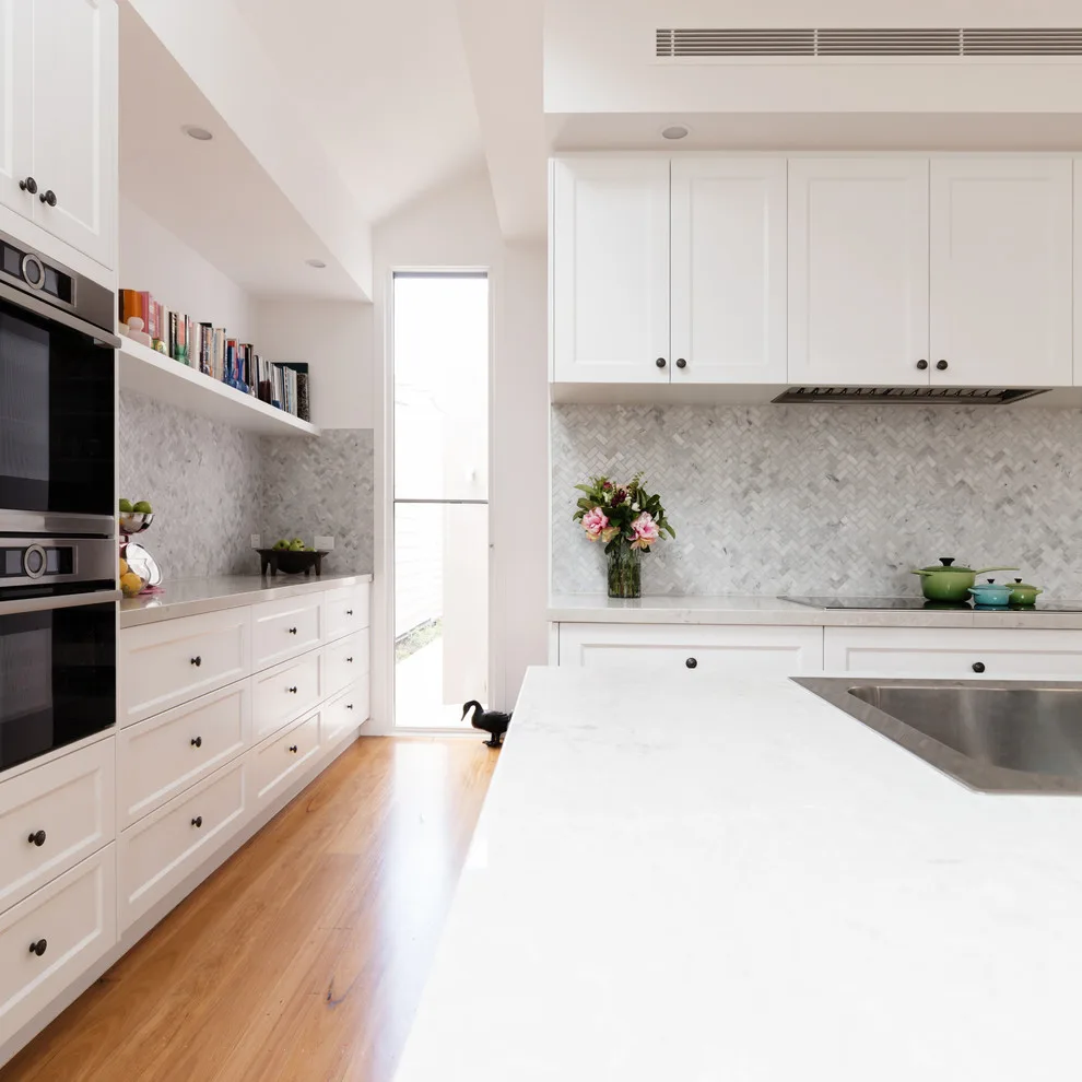 Impeccably White Kitchen by Kitchen Master Design & Remodeling LLC - Photo 4