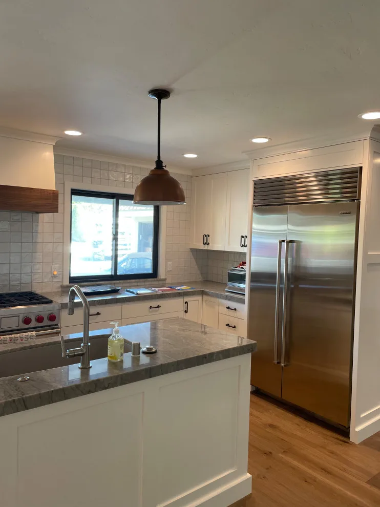 Contemporary Complete Home Renovation by Regal Contracting Company - Photo 19