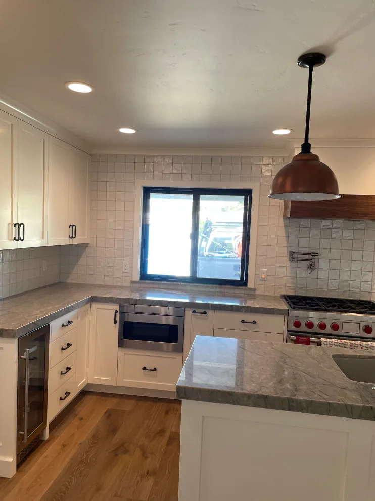 Contemporary Complete Home Renovation by Regal Contracting Company - Photo 9