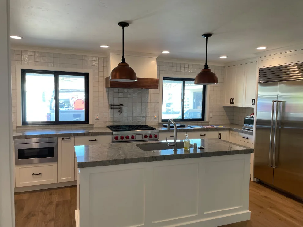 Contemporary Complete Home Renovation by Regal Contracting Company - Photo 11