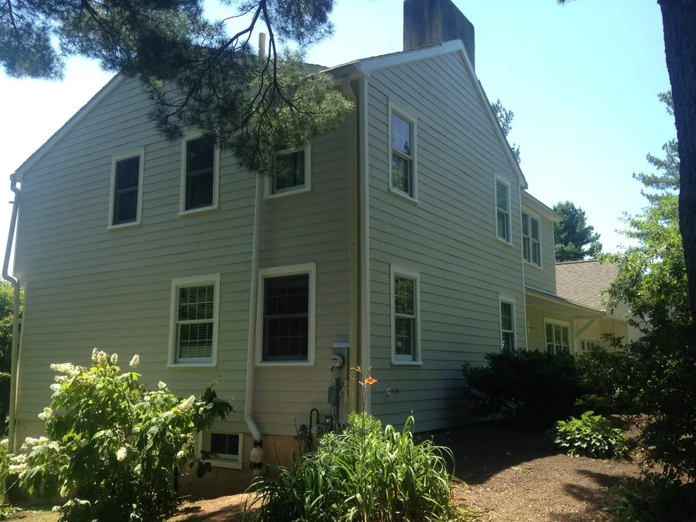 Updated Siding and 8-Foot Garden Retaining Wall by J. Neville Construction - Photo 2