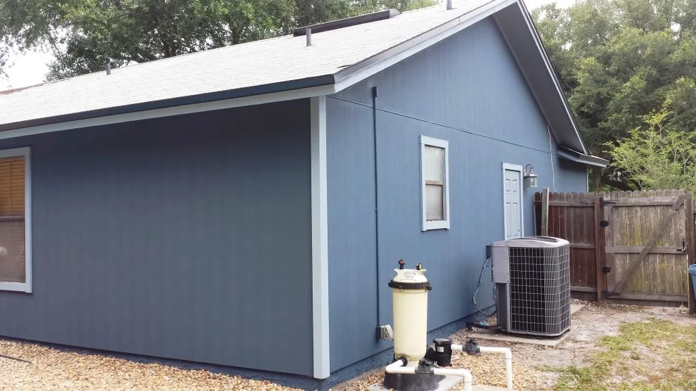 Updated Exterior: Siding, Painting, and Window Installation by Miller Construction Group, LLC - Photo 4