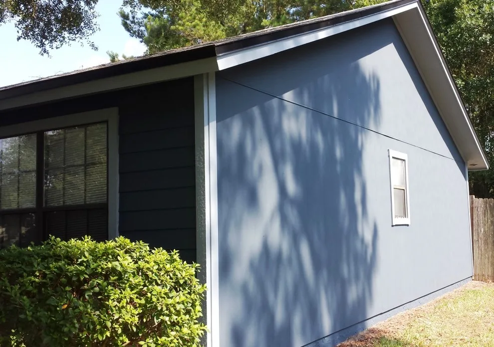 Updated Exterior: Siding, Painting, and Window Installation by Miller Construction Group, LLC - Photo 3