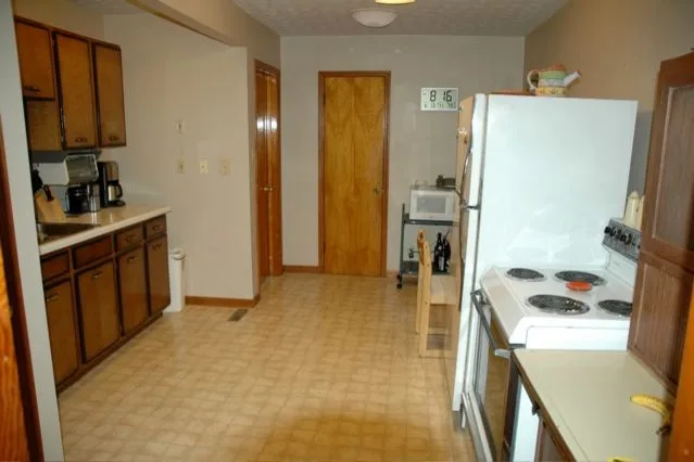 Medallion: Bachelor Pad Kitchen with Beer Tap by The Kitchen Place - Photo 6