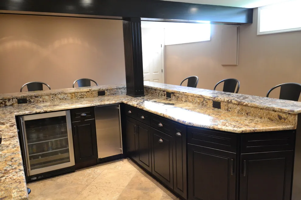 Walker basement renovation with wet bar by Remodeling And Painting Experts Inc. - Photo 15
