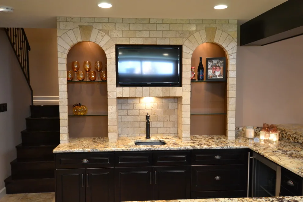 Walker basement renovation with wet bar by Remodeling And Painting Experts Inc. - Photo 2