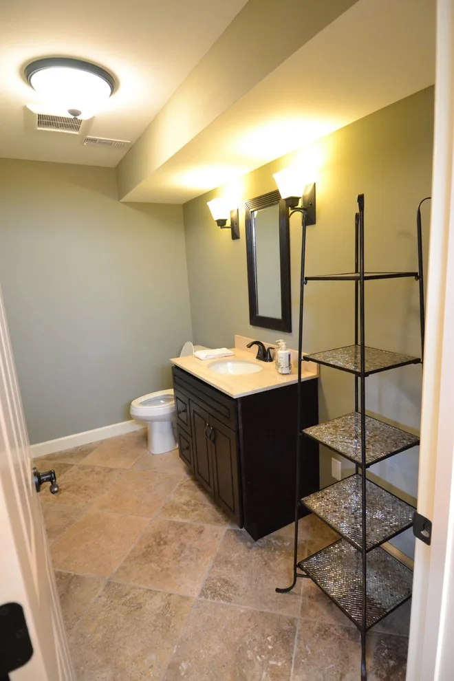 Walker basement renovation with wet bar by Remodeling And Painting Experts Inc. - Photo 9