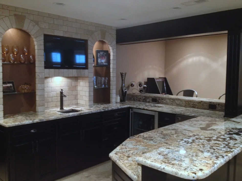 Walker basement renovation with wet bar by Remodeling And Painting Experts Inc. - Photo 19