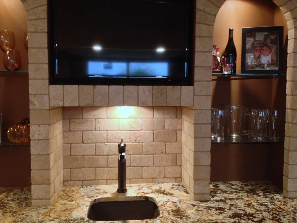 Walker basement renovation with wet bar by Remodeling And Painting Experts Inc. - Photo 6