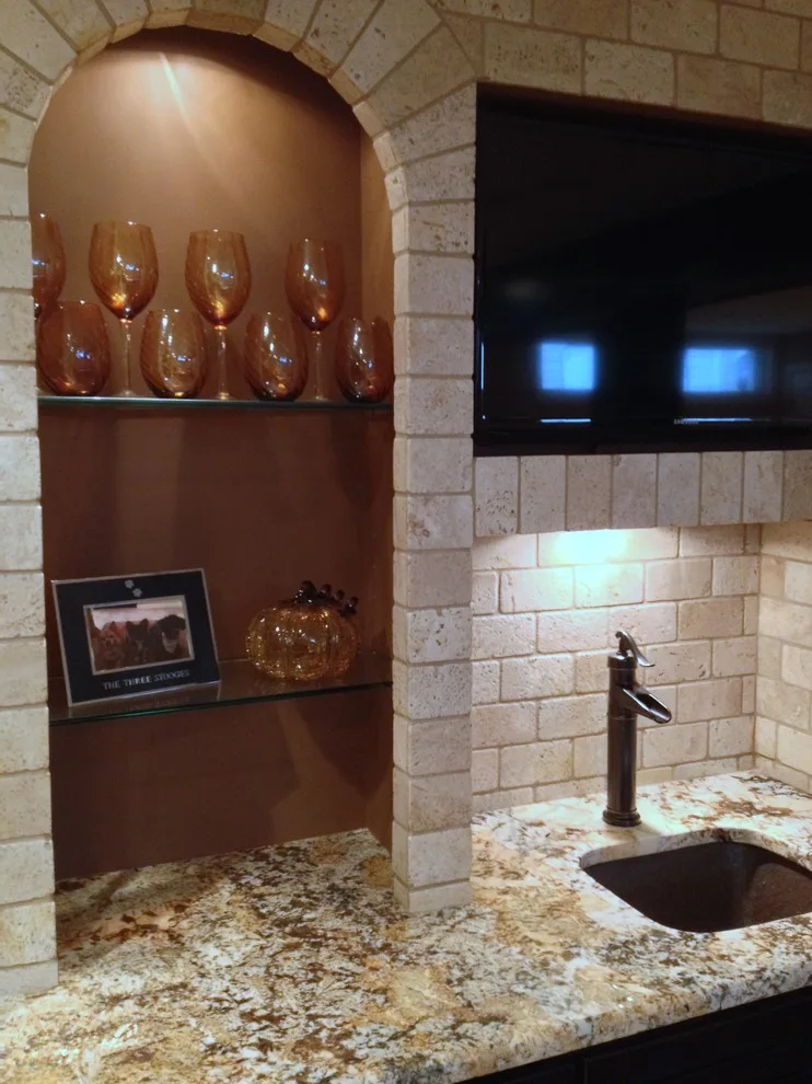 Walker basement renovation with wet bar by Remodeling And Painting Experts Inc. - Photo 11