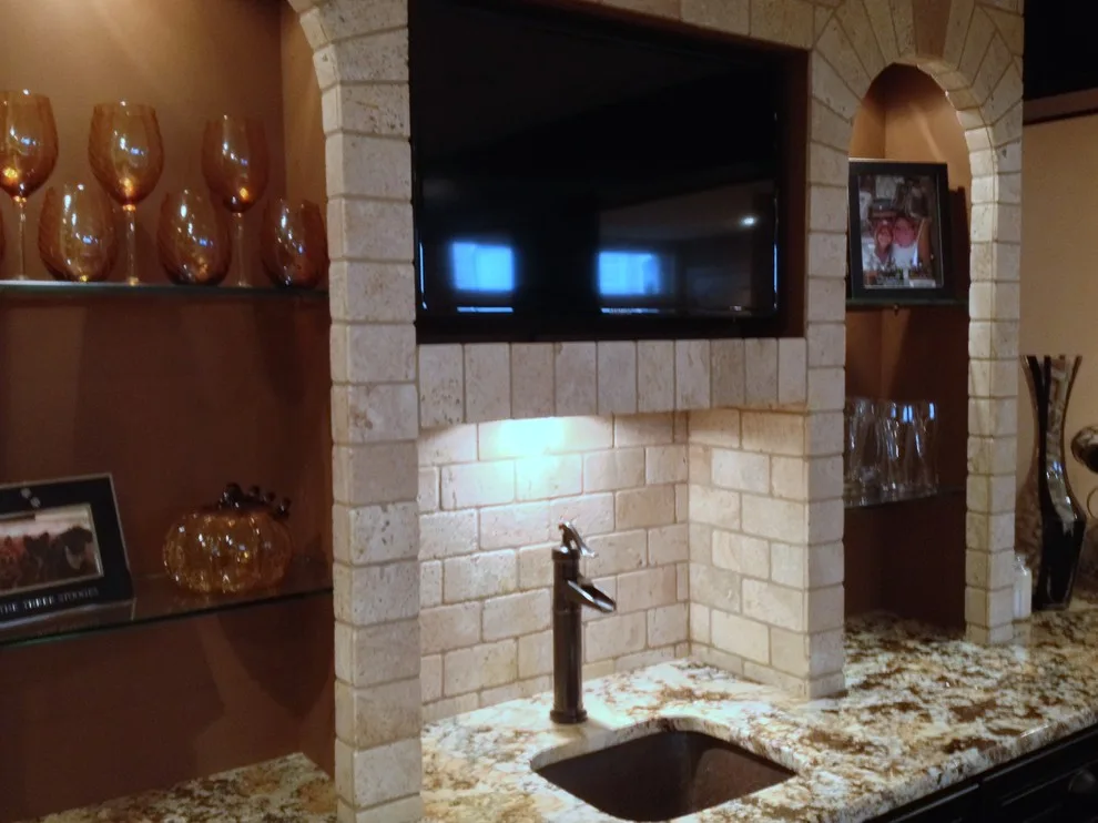 Walker basement renovation with wet bar by Remodeling And Painting Experts Inc. - Photo 13