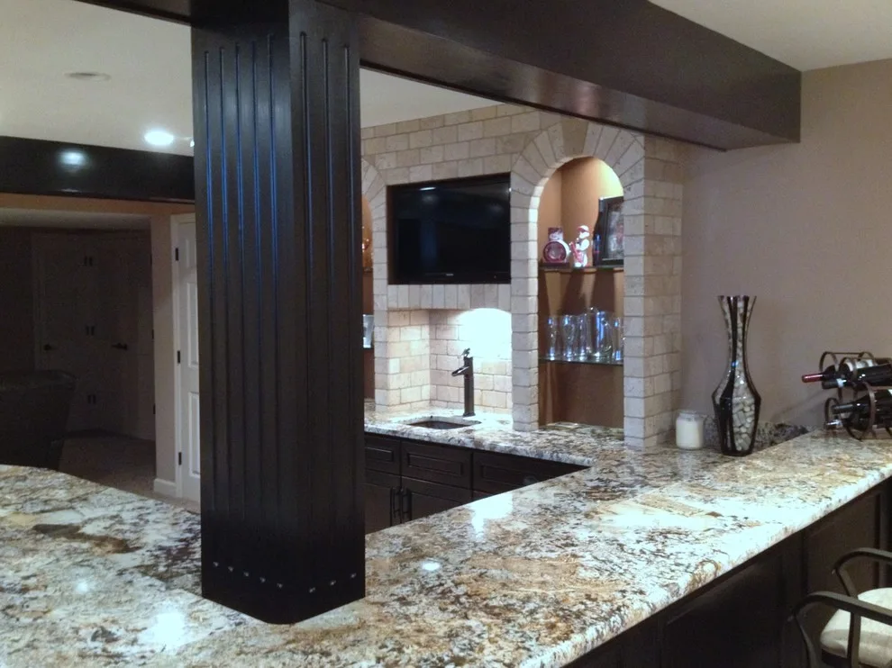 Walker basement renovation with wet bar by Remodeling And Painting Experts Inc. - Photo 12