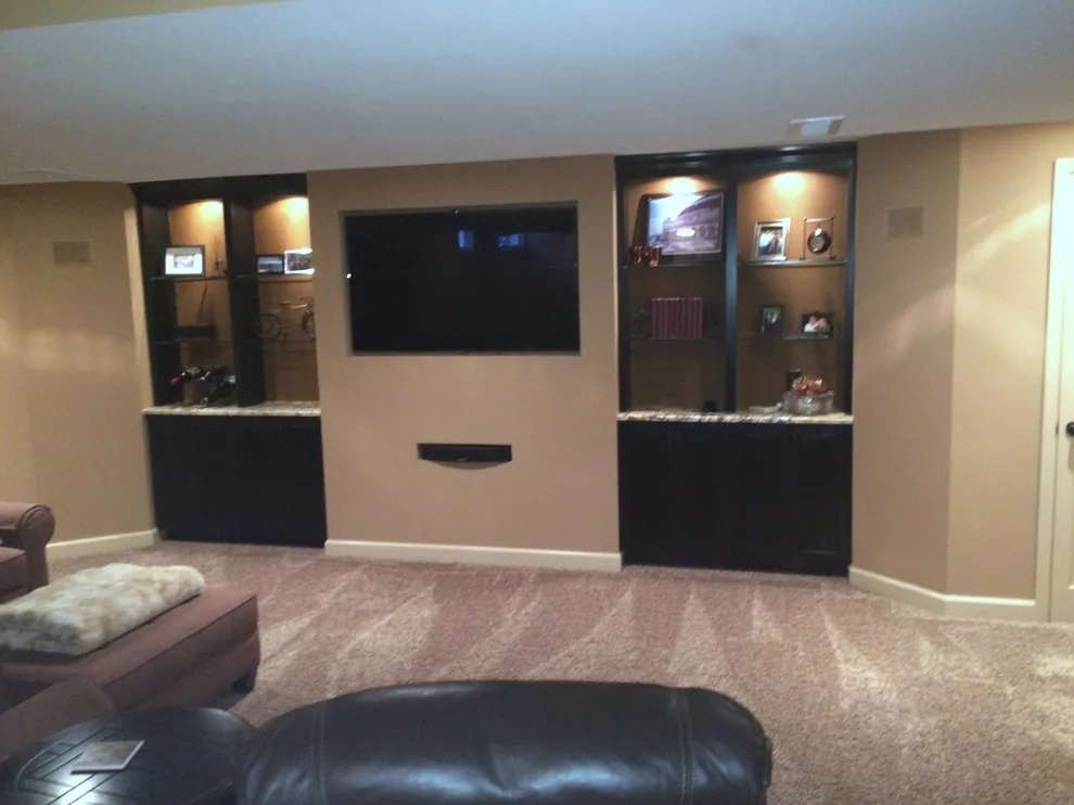 Walker basement renovation with wet bar by Remodeling And Painting Experts Inc. - Photo 18