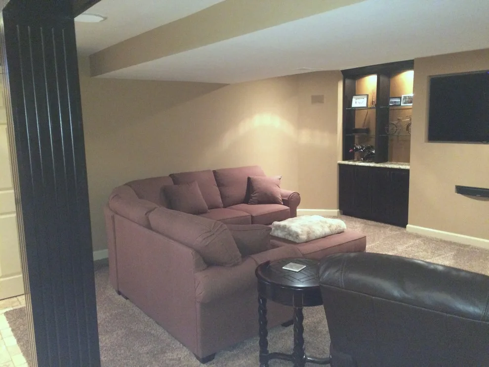 Walker basement renovation with wet bar by Remodeling And Painting Experts Inc. - Photo 4