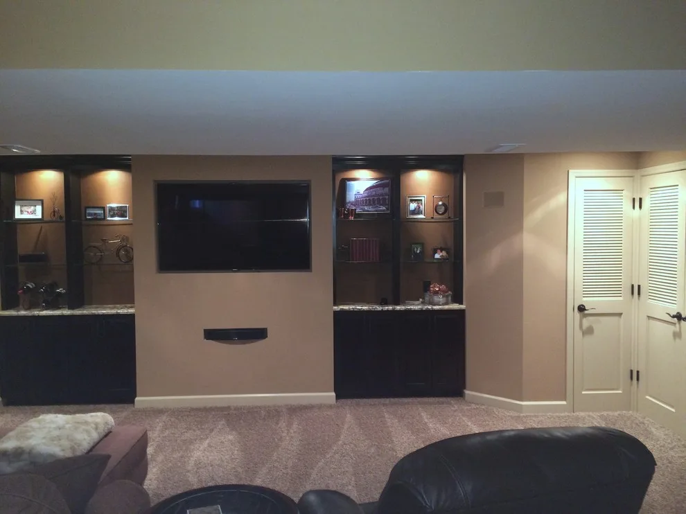 Walker basement renovation with wet bar by Remodeling And Painting Experts Inc. - Photo 7