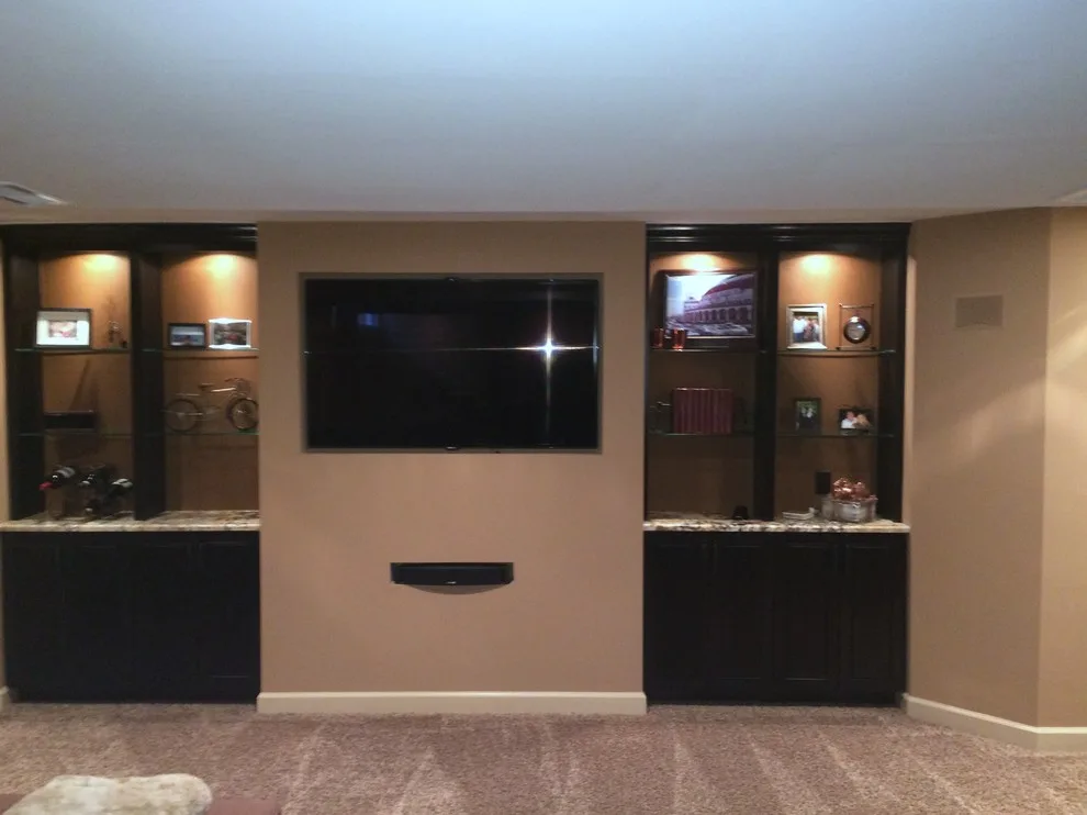Walker basement renovation with wet bar by Remodeling And Painting Experts Inc. - Photo 17