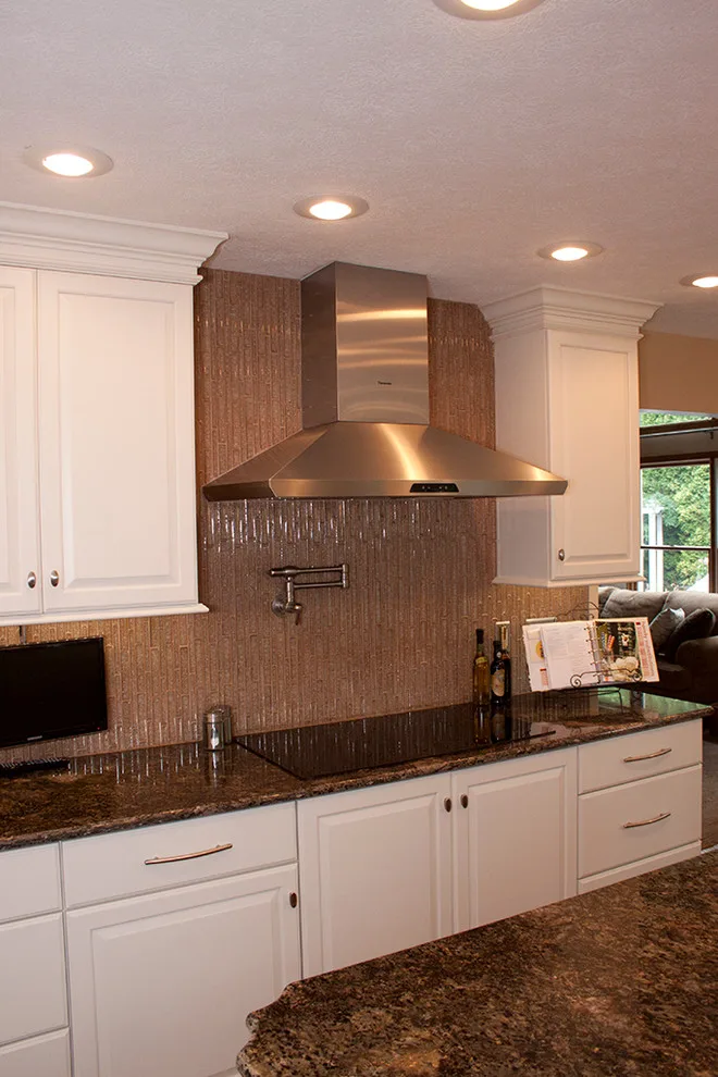 Contrasting Island in a White Kitchen by Kitchens & Interiors, Inc. - Photo 10