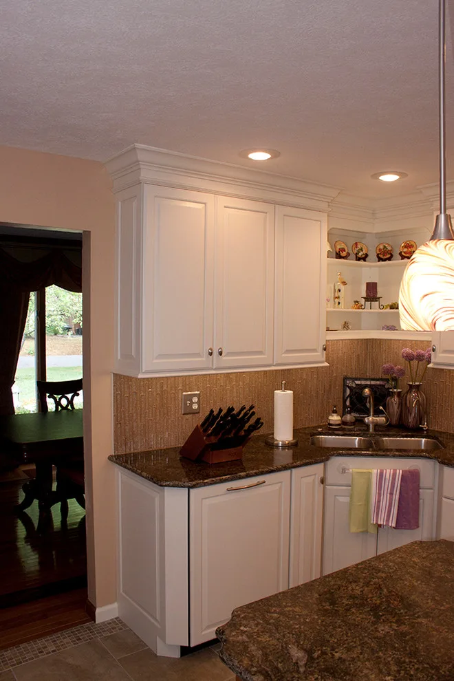 Contrasting Island in a White Kitchen by Kitchens & Interiors, Inc. - Photo 6