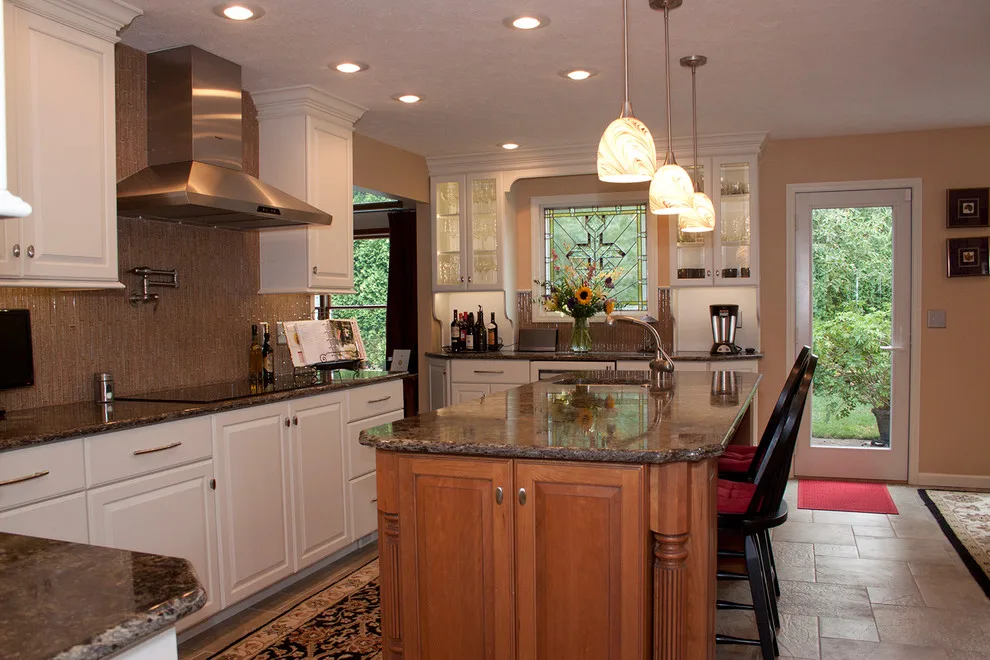 Contrasting Island in a White Kitchen by Kitchens & Interiors, Inc. - Photo 13